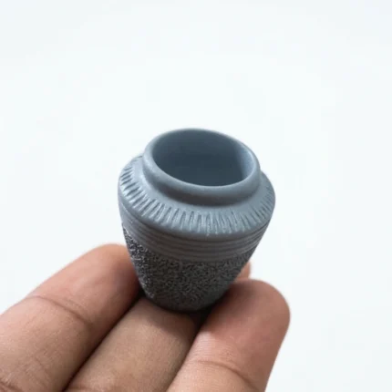 Beautifully crafted miniature ceramic storage pot, a charming product for dollhouse or tiny item organization.