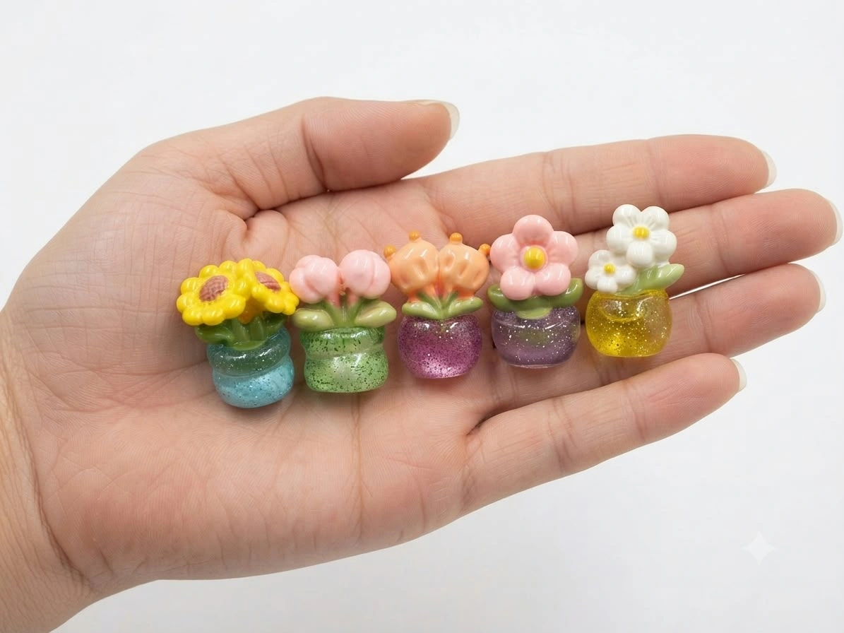 Miniature-Glitter-Flower-Pot-Set-of-5 Charming miniature glitter flower pot, randomly selected, adds sparkle to your dollhouse product display.
