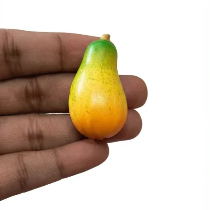 Highly detailed miniature green pear figurine, this product is ideal for dollhouse scenes or food displays.