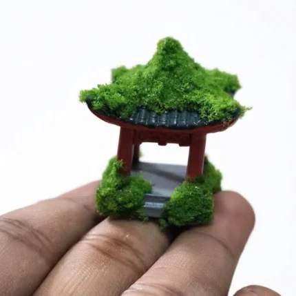 Detailed miniature Japanese temple product with serene moss garden, ideal for desk or shelf display.