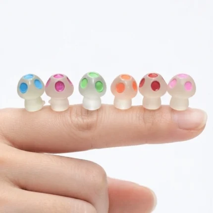 Charming miniature mushroom figurine product, randomly selected, adds whimsical touch to any display.