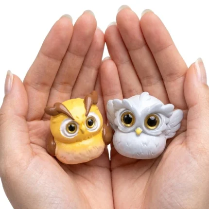 A charming, randomly selected miniature owl figurine product, perfect for collectors and miniature displays.