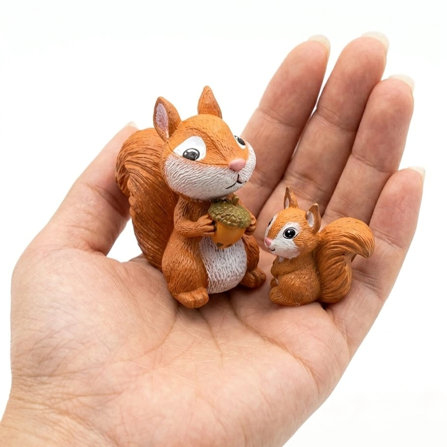 Miniature-Squirrel-Figurine-Set-of-2 A charming miniature squirrel figurine set of 2 product, great for adding nature to any display or collection.