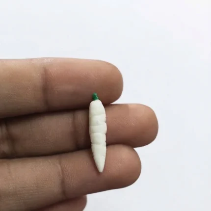 A beautifully detailed miniature white pea pod figurine product, perfect for collectors and miniature enthusiasts.