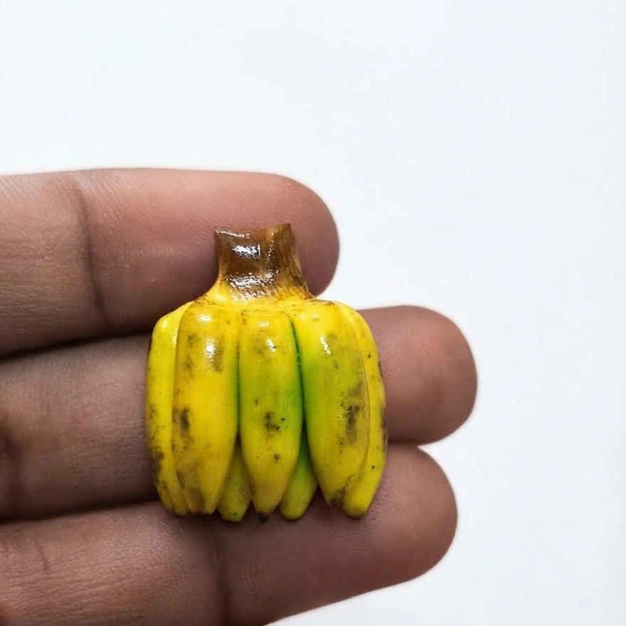 Miniature-Yellow-Banana-Bunch-Figurine Detailed yellow miniature banana bunch figurine product for dollhouse kitchens or dioramas.