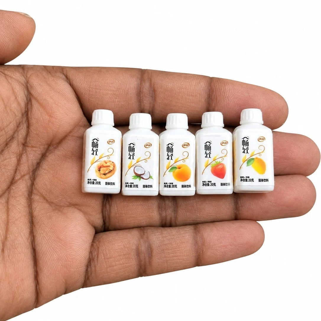 Miniature-Fruit-Beverage-Bottle-Set-of-5 Charming miniature fruit drink bottle, random selection, collectible product for dollhouses or dioramas.