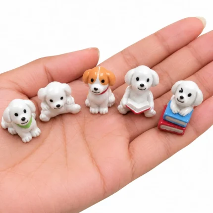 A charming miniature puppy with books figurine product, featuring a random design for unique desk or shelf decor.