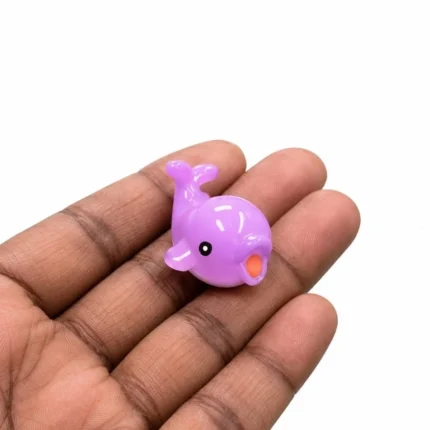 A beautifully detailed miniature purple whale animal figurine product, perfect for collectors and home decor.