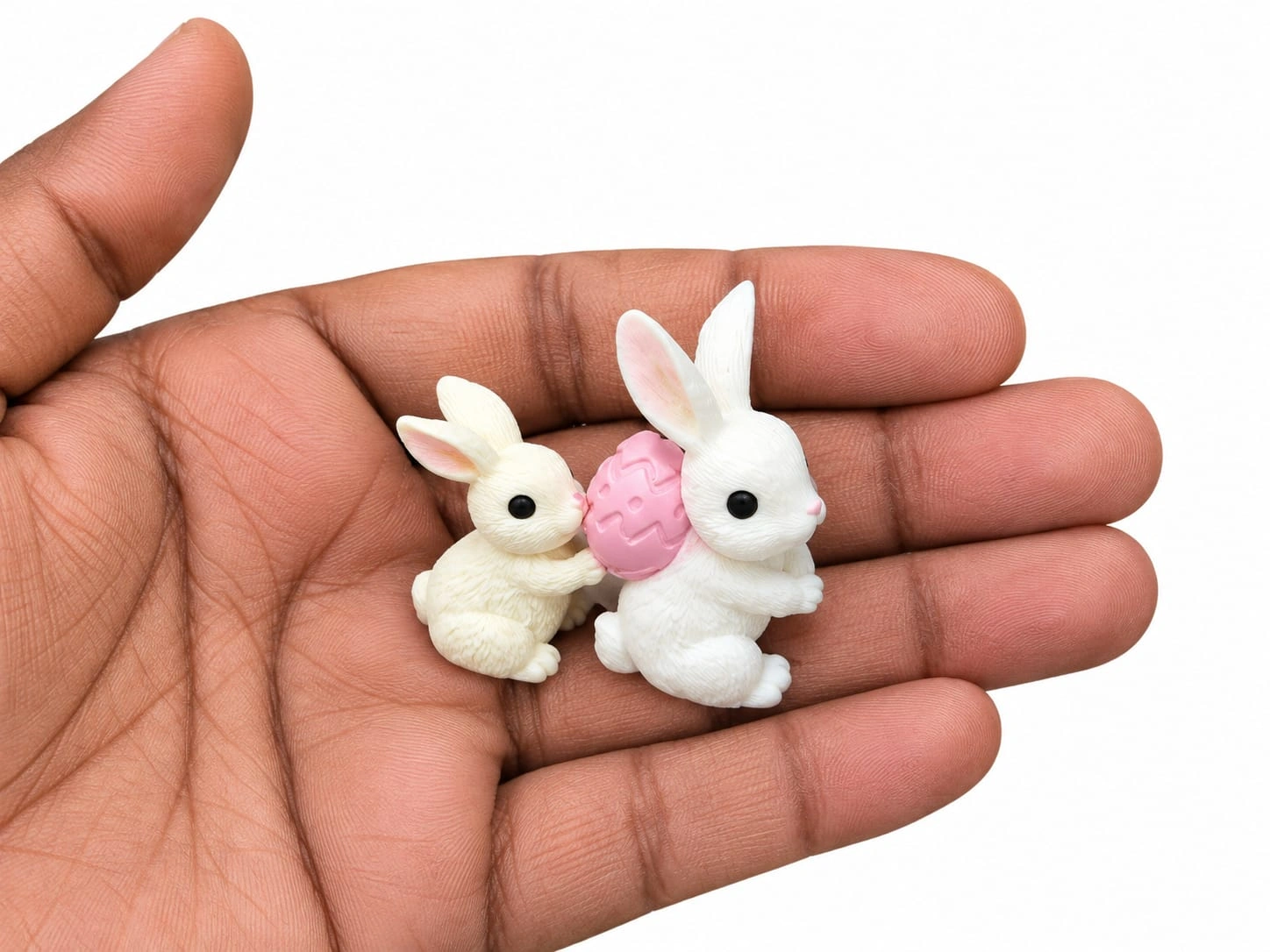 Miniature-Rabbit-Pair-with-Pink-Easter-Egg Charming miniature rabbit pair with a pink Easter egg, perfect for dollhouse scenes, this product.