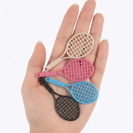 Random miniature badminton racket product for dollhouse sports scenes or miniature collectors.